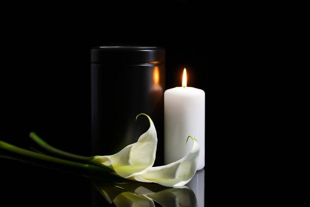 mortuary urn burning candle
